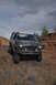 1991 Ford Bronco - This 1991 Ford Bronco navigates a challenging off-road course, its capabilities on a rocky trail.