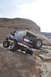1991 Ford Bronco - 1991 Ford Bronco navigating a challenging rocky trail in Moab.