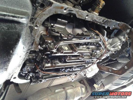 Close-up of an automatic transmission valve body with wiring