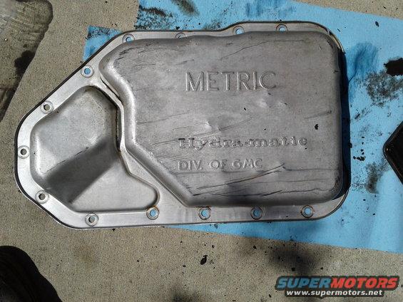 transmission pan with 'METRIC Hydra-matic DIV. OF GMC' stamped on it