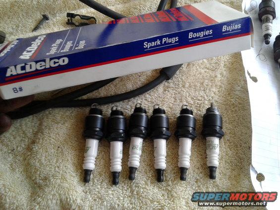 ACDelco spark plugs laid out with their box