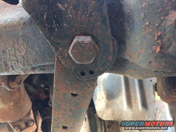 0e8b1368de694ffbbe05f4faf6386ac3.jpg this is a shot of the driver's side caster adjuster.  as you can see the small bolt that holds it in place has sheared off in the radius arm, allowing the axle to rotate when its not supposed to.

see this to see how it is supposed to look:
[url=http://www.supermotors.net/registry/media/1109830][img]http://www.supermotors.net/getfile/1109830/thumbnail/d892461efd54456091ca77f9ecac6d4f.jpg[/img][/url]