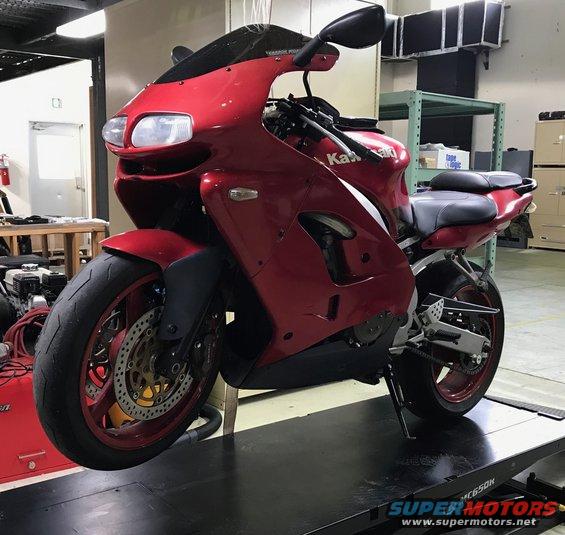 1998 ZX9R suspended for fork leg removal 
