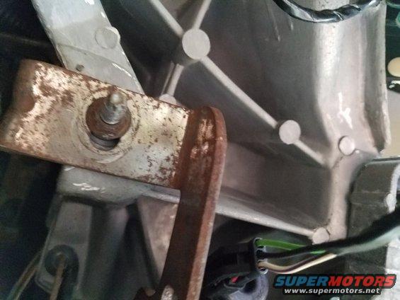 Rusted metal bracket and wiring harness