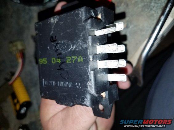 Ford electrical component with '95 04 27A' visible