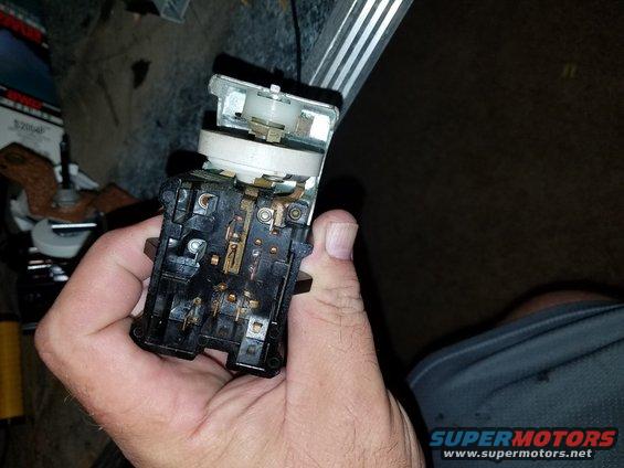 Interior electrical switch assembly held in hand