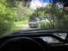 1989 Ford Bronco - The dashboard shows a Ford logo and several stickers, including one with a man's face and text.