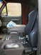 1989 Ford Bronco - Custom racing seats and center console installed in a vehicle's interior.