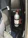 1989 Ford Bronco - Interior view showing a fire extinguisher and seatbelt, likely in an older vehicle.