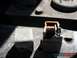 1989 Ford Bronco - An automotive relay with visible copper windings is shown in this close-up view.