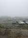 1989 Ford Bronco - Multiple off-road vehicles are gathered in a foggy outdoor environment.