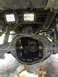 1989 Ford Bronco - The differential housing is open, revealing internal gears, with two auxiliary LED lights mounted overhead.