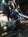 1989 Ford Bronco - Close-up view of an engine bay, focusing on a PSC reservoir and associated engine components.