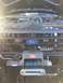1989 Ford Bronco - Front view of a 1989 Ford Bronco's engine bay, showing the grille, winch, and engine components.