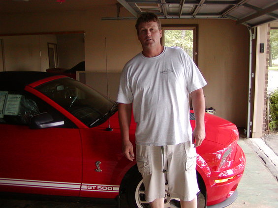 Red convertible GT 500 with white racing stripes