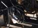 1989 Ford Bronco - Close-up view of a fuel filter installed in the engine bay, showing hoses and wiring.