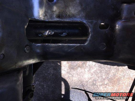 Engine bay frame modification with cut-out