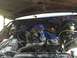 1989 Ford Bronco - Engine bay view of a V8 motor with various components and wiring clearly visible.
