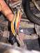1989 Ford Bronco - Electrical connectors and wiring harness detail, some wires are taped.