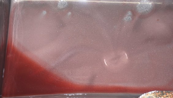 Transmission fluid with metallic particles visible