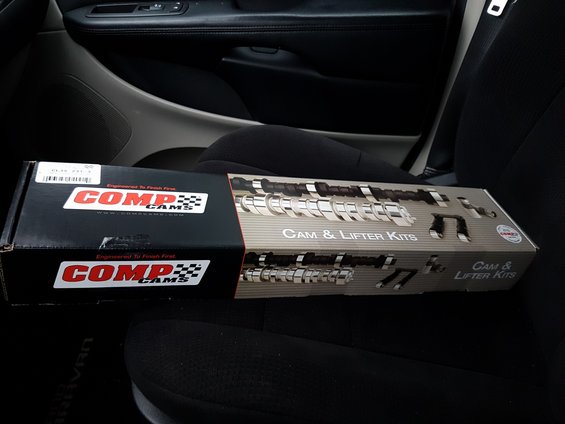 Comp Cams Cam & Lifter Kits boxes on car seat