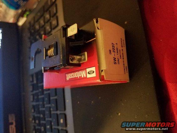 Motorcraft cruise control switch in red box with Ford logo