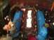 1989 Ford Bronco - Close-up view of an engine bay bright blue valve covers and exposed fuel injectors.