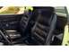 1971 Ford Mustang - Interior view of a classic car, showing the front seats and door panel.