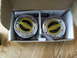 1989 Ford Bronco - Two new Warn manual locking hubs are shown inside their original packaging with instructions.