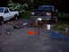 1989 Ford Bronco - 1989 Ford Bronco undergoing maintenance with tools and equipment nearby.