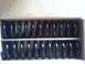 1989 Ford Bronco - Two sets of black coil springs are visible inside a cardboard box.