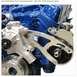 1971 Ford Mustang - Close-up of a polished aluminum power steering bracket attached to a blue Ford small block engine.