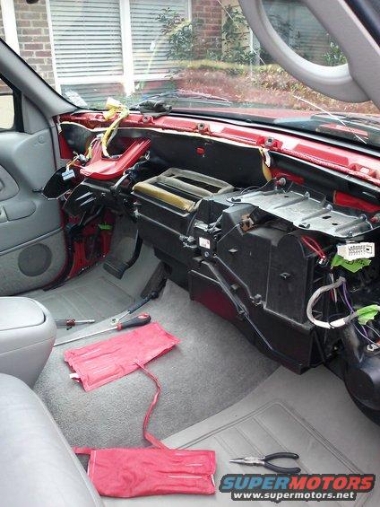1998 Chevrolet C/K Pickup dashboard disassembled, showing HVAC unit and wiring