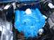 1978 Ford F-250 - A freshly painted blue engine block is visible in the engine bay, with some wiring and components around it.