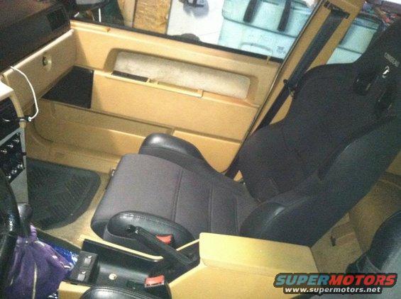 1991 Volvo 940 interior with tan door panels and black racing seats