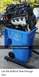 1968 Mercury Cougar - An engine is placed inside a blue recycling bin, with text overlaying the image.