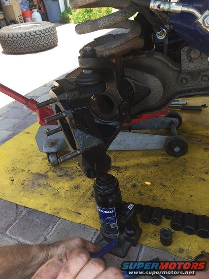 img_9820.jpg Putting the knuckles in place is very tricky, we used a hydraulic jack to push it up.