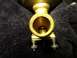 1967 Mercury Cougar - A brass fitting, possibly a valve or connector, is shown in detail against a dark background.