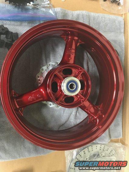 1998 ZX9R wheel lollypop red over super chrome base powder coat, new rotors, new bearings, new seals