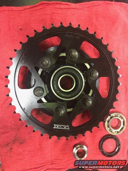 1998 ZX9R wheel lollypop red over super chrome base powder coat, new rotors, new bearings, new seals