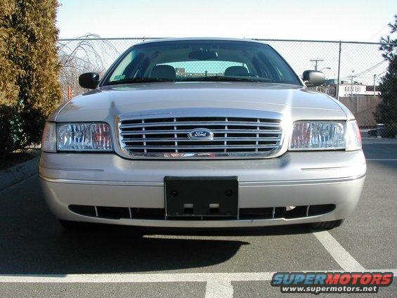 03-crown-vic-lx-front2.jpg Front view. Stock so far, mmmkay?  Had plate frame added because car was originally from Alabama. Adding black slotted grille. Adding black bumper inserts front and rear...