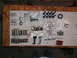 1963 Ford Galaxie - Various engine components are organized on a workbench for inspection or assembly.