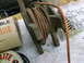 1963 Ford Galaxie - A close-up view of a wooden hose reel and associated items, with no vehicle visible.