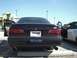 1999 Ford Taurus - Rear view of a 1999 Ford Taurus SHO parked in a lot, showing its dual exhaust and license plate.