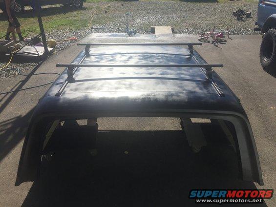 Vehicle roof rack assembly, appears to be from an SUV