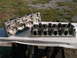 1963 Ford Galaxie - Two engine cylinder heads are displayed on a table, ready for installation or inspection.