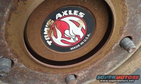 Tom's Axles hubcap with Made in U.S.A. text