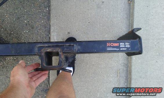 CURT trailer hitch receiver with visible text and branding
