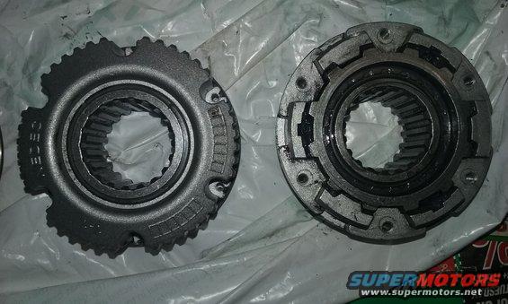 Two transfer case parts, one with "CEGE" visible