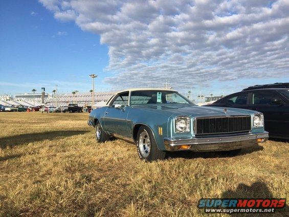 Blue 1975 Chevrolet Chevelle coupe with white roof parked on grass